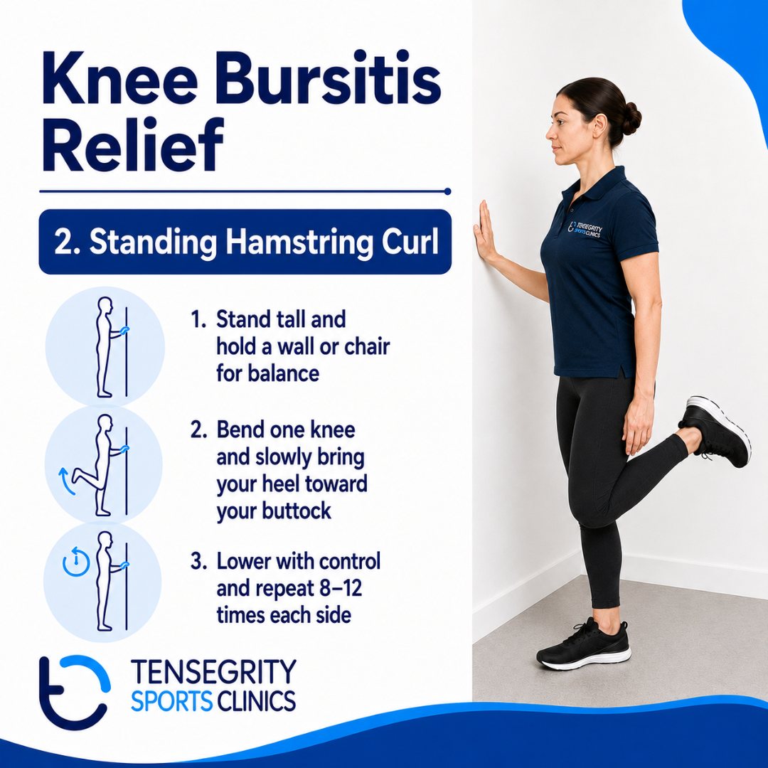 Standing hamstring curl for knee bursitis, holding a wall for balance and bending one knee